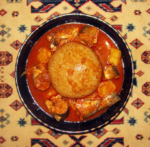 Libyan bazin with fish and potatoes.