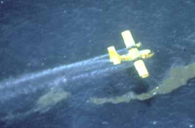 Use of airplane to apply dispersant to an oil spill