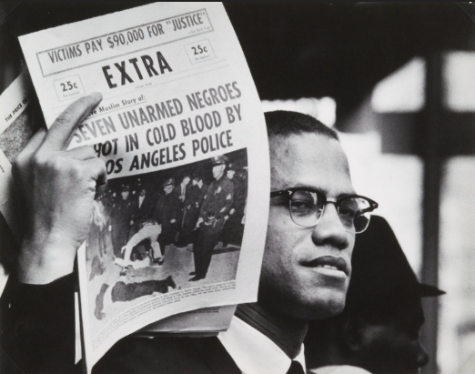 Gordon Parks photo of the Malcolm X with newspaper.