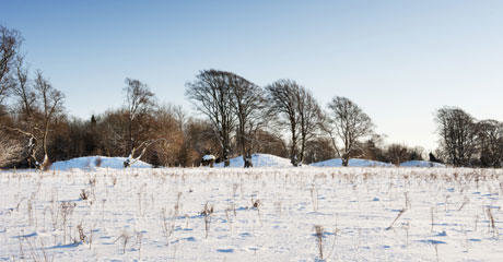 Kings barrows viewed in the snow adopted from English Heritage NMR.