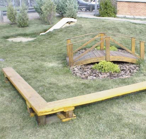 Objects in an outdoor learning and playing environment