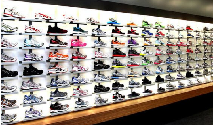 Assortment of athletic shoes in display