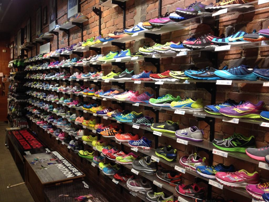 Assortment of athletic shoes in display