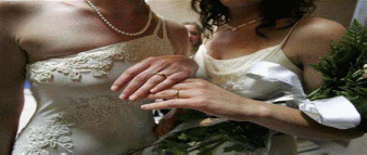 Lesbians using rings as a symbol of engagement.