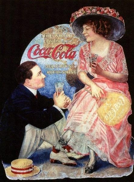a happy couple enjoying time alone while drinking Coke.