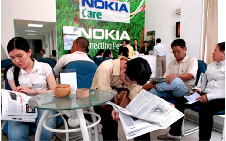 Clients wait for assistance at a Nokia customer care centre