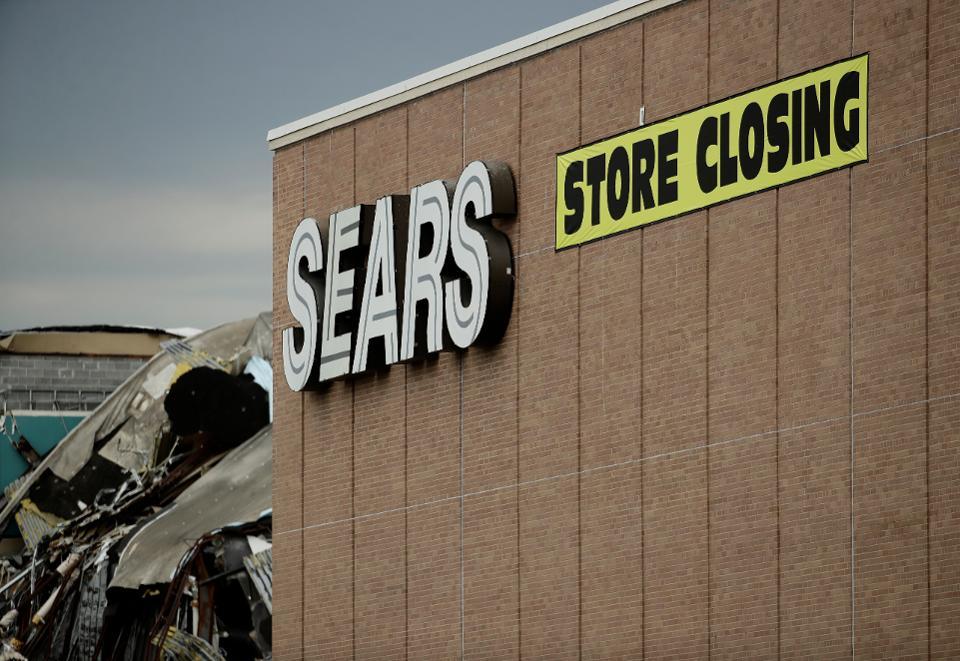 A Sears store closing sign.