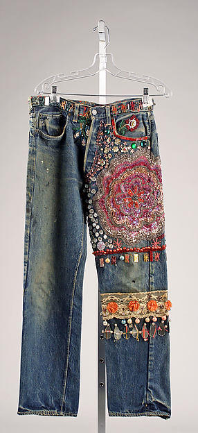 Jeans with patches and additional decorations.