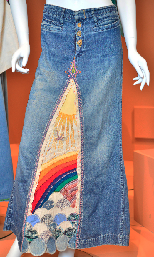 An embroidered jean skirt.