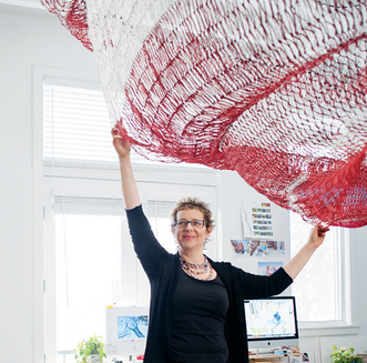 Janet Echelman with the element of her sculpture.