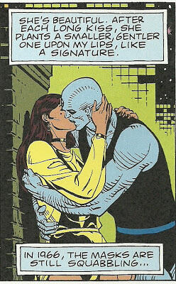 Silk Spectre and Dr. Manhattan kiss.