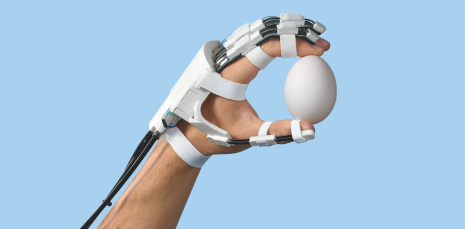The physical appearance of the exoskeleton hand in use.