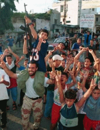 Palestinians celebrating the 9/11 attacks.