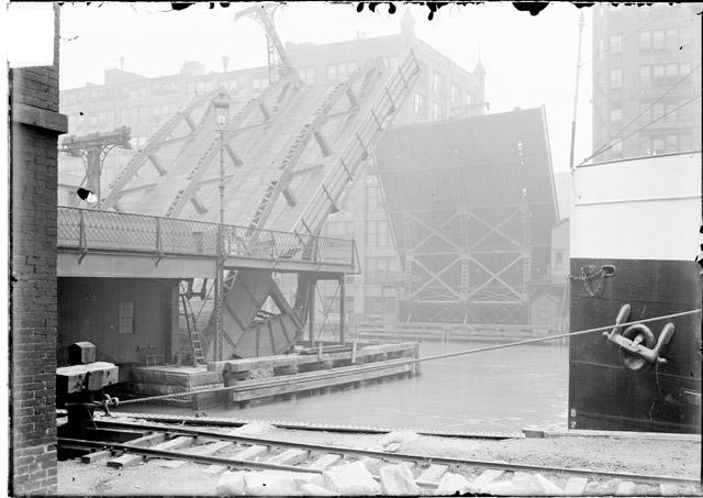  Jack Knife Bridge in Raised Position Over the Chicago River, Dark Exposure (Chicago Daily News, Inc., photographer).