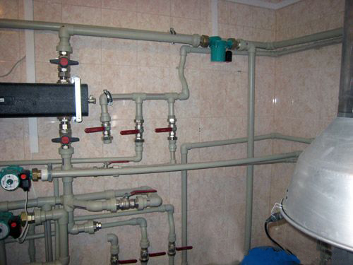 The valves control cold water supply, water supply to and from the boiler, and wastewater supply.