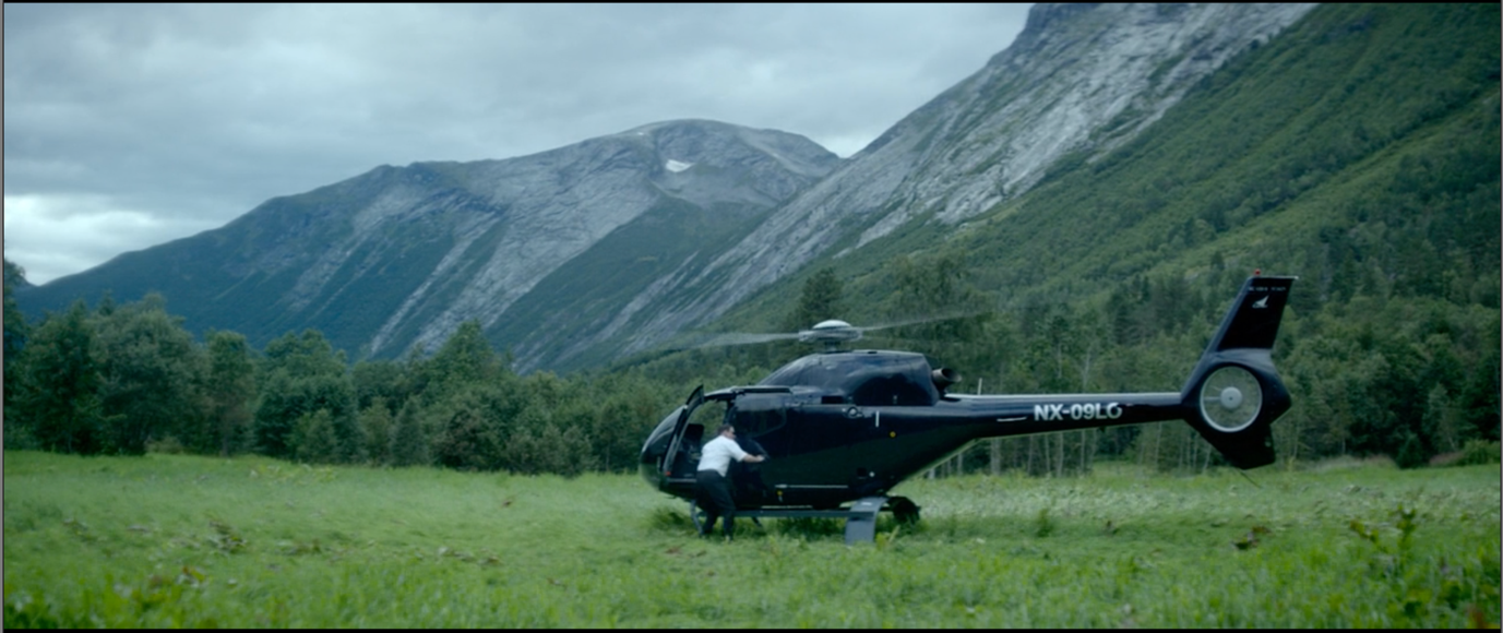 Although the picture cannot convey the contrast of sounds, one can imagine how incompatible the combination of the helicopter's noise and the mountains' free silence is 