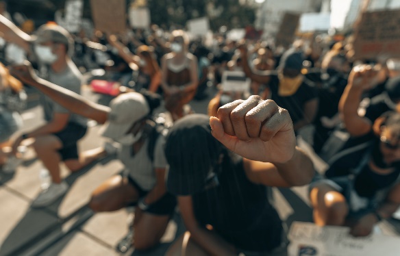 Protestors taking the knee in solidarity 