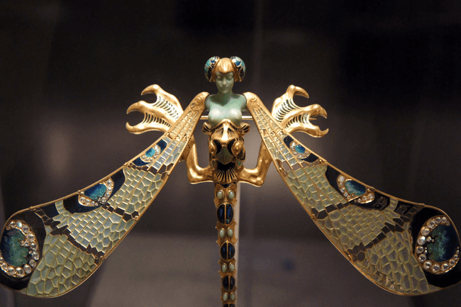 Dragonfly-woman brooch made of gold