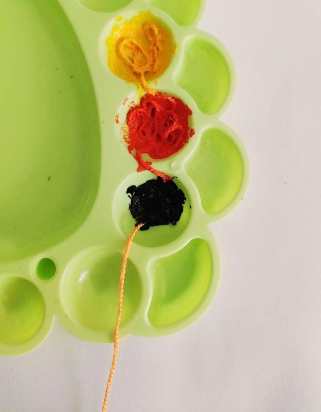 Dipping Thread into Paint