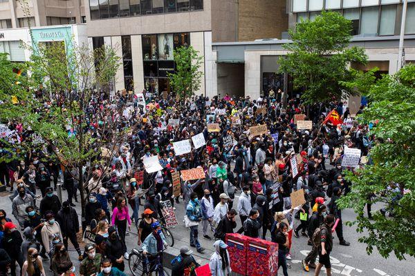 Protesters march to highlight the deaths in the US.